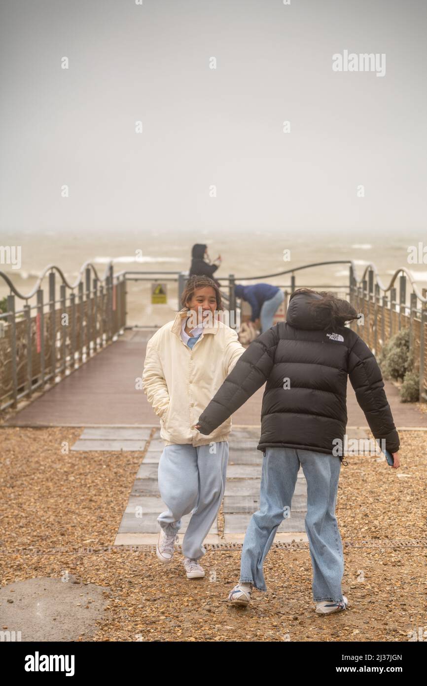 East Sussex, UK. 6th april 2022, Strong winds and heavy rain dampen the Easter school holidays as tourists brace the bad weather at  Birling Gap ,East Sussex, UK. Stock Photo