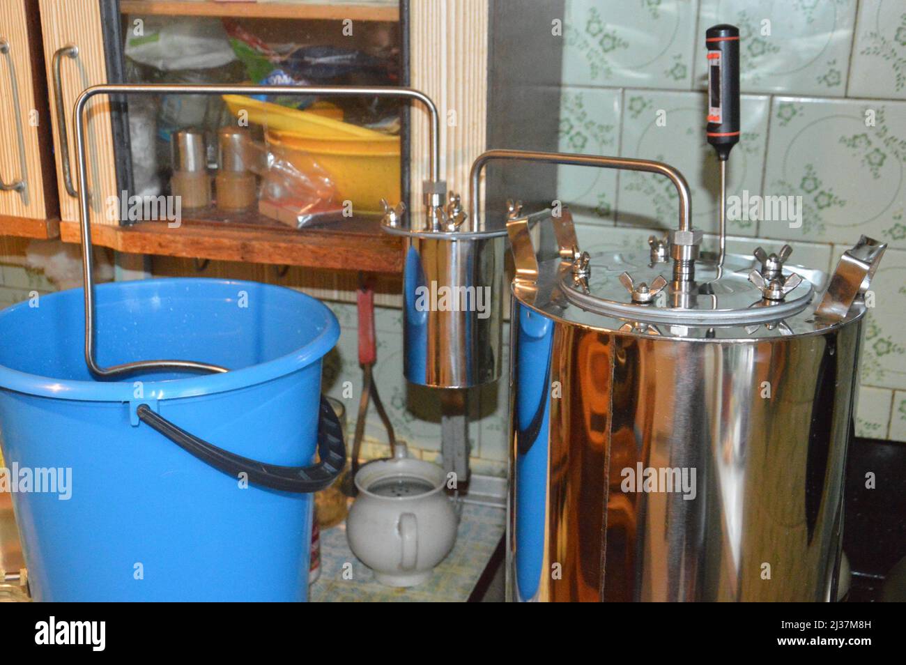 Moonshine still and parts for making distilled a alcohol Stock Photo