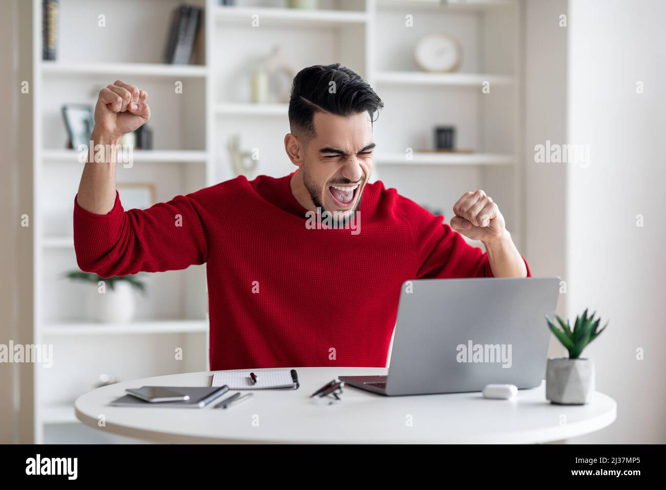 Overjoyed middle eastern male hi-res stock photography and images - Alamy