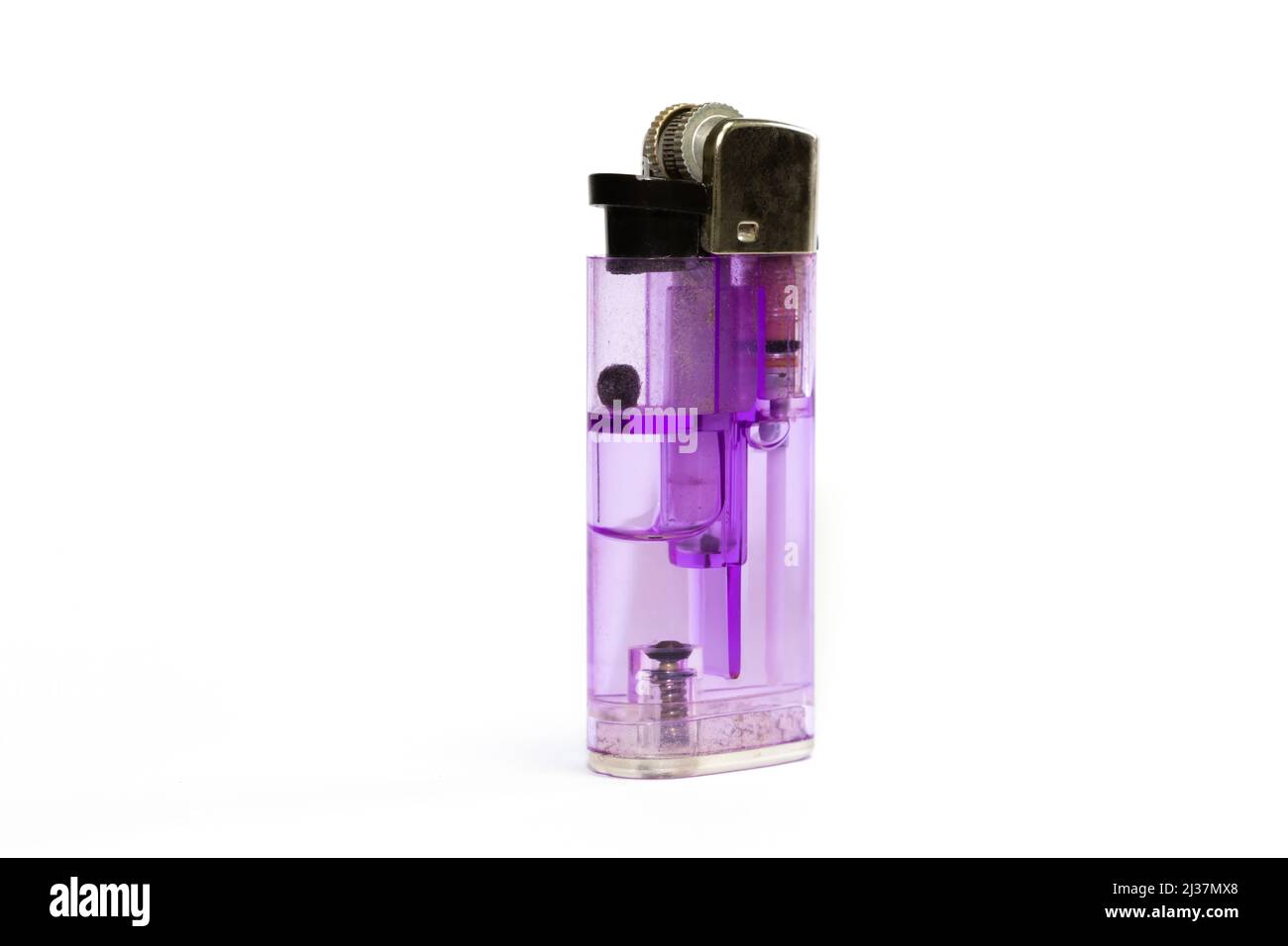 Purple colored plastic lighter on an isolated white background. Stock Photo