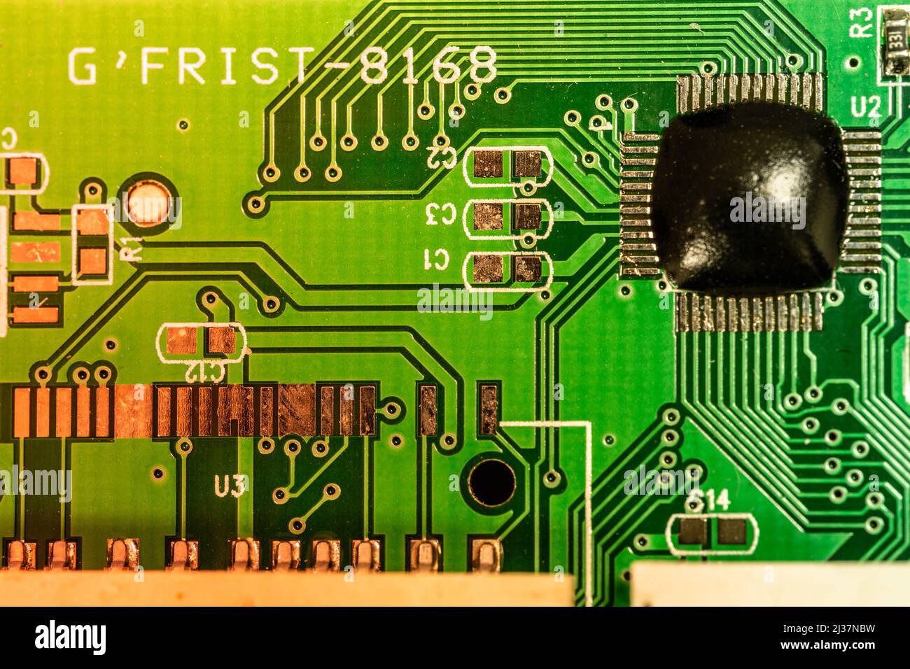 PCB board of a CF, micro SD and SD card reader. Electronic circuit elements and connection inputs on the main board. Stock Photo