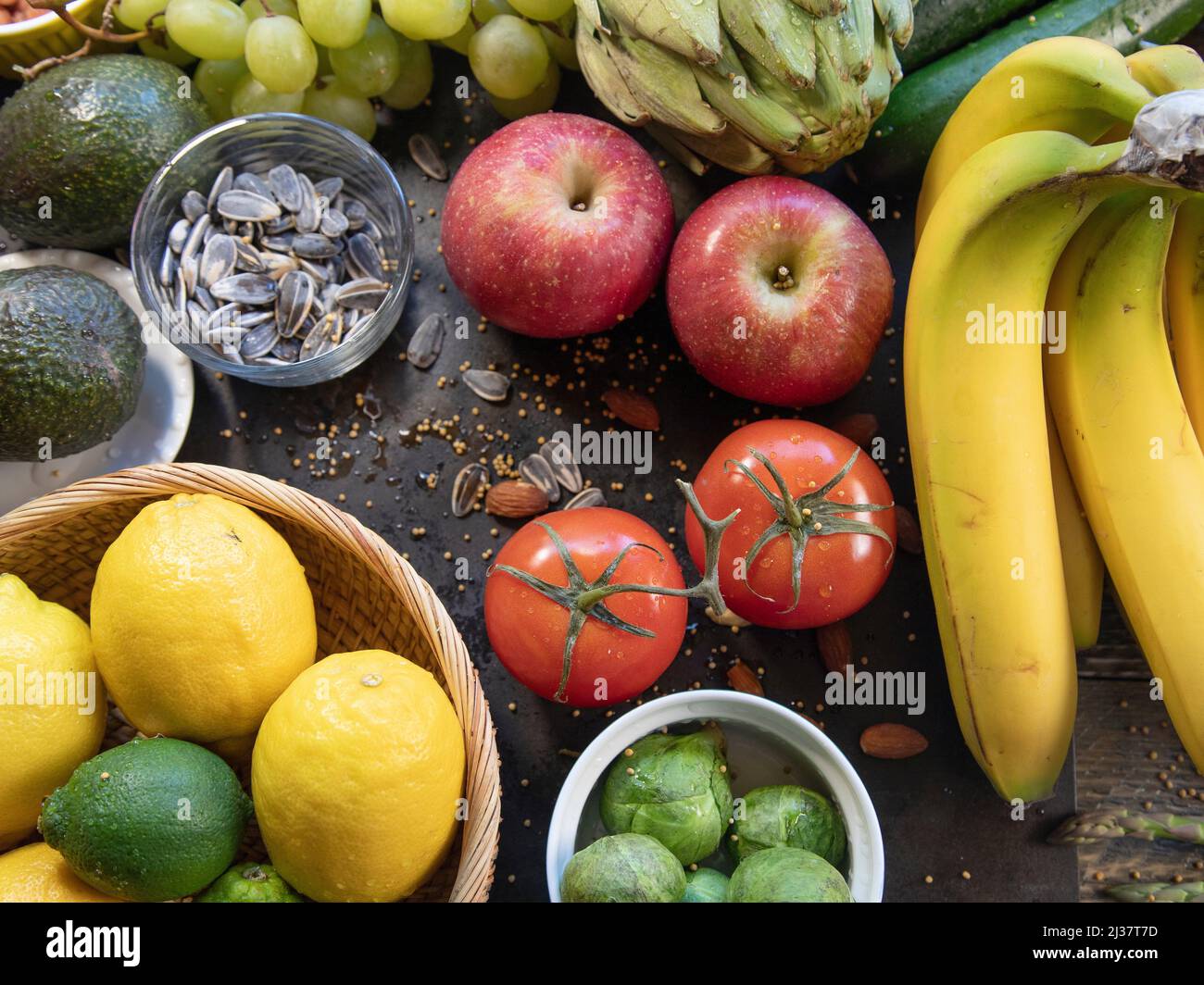 Mediterranean Diet food displayed on natural surfaces top view. Stock Photo