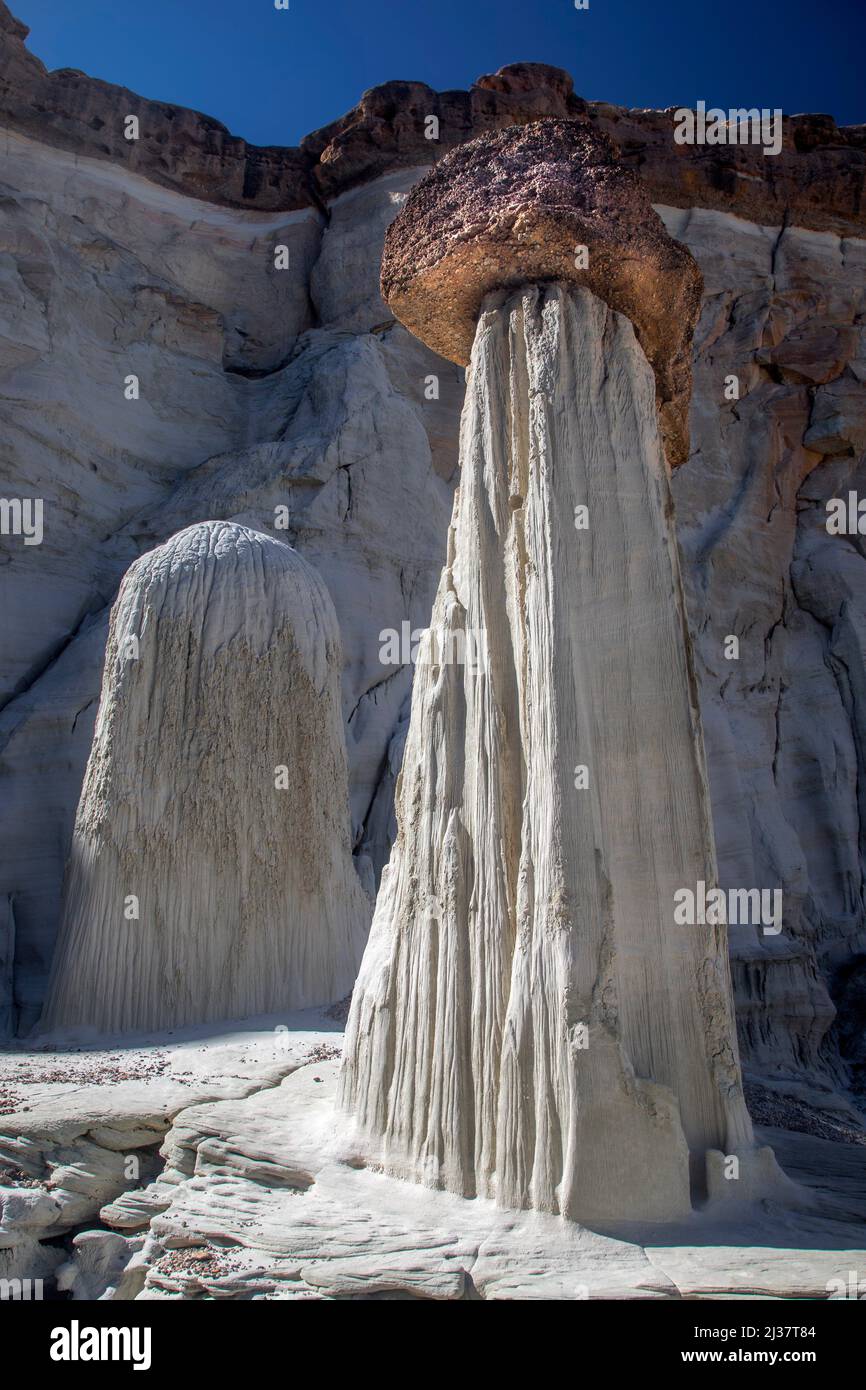 The distinctive sandstone rock formations know as the Wahweap Hoodoos stand out in the Southern Utah landscape. Stock Photo