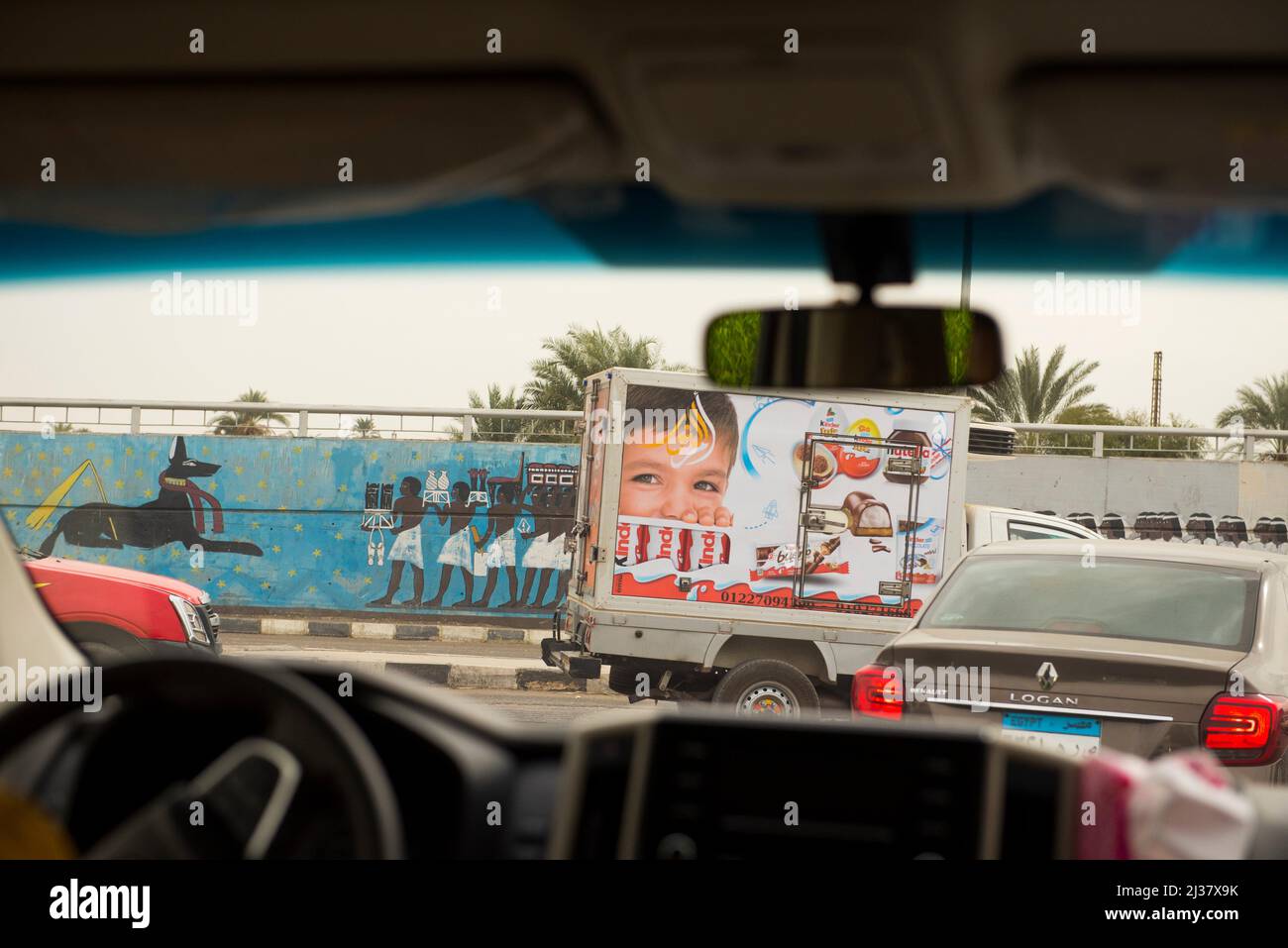 Road traffic seen from inside a car, Luxor, Egypt, Northeast Africa. Stock Photo