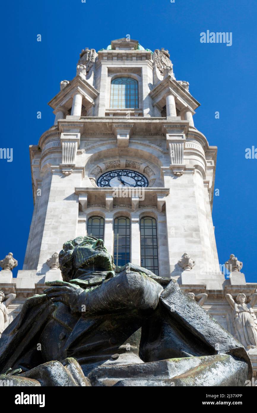 Europe, Portugal, Porto, Building of the Câmara Municipal (City Hall) of Porto with detail of Bell-Tower and Statue of Poet Almeida Garrett. Stock Photo