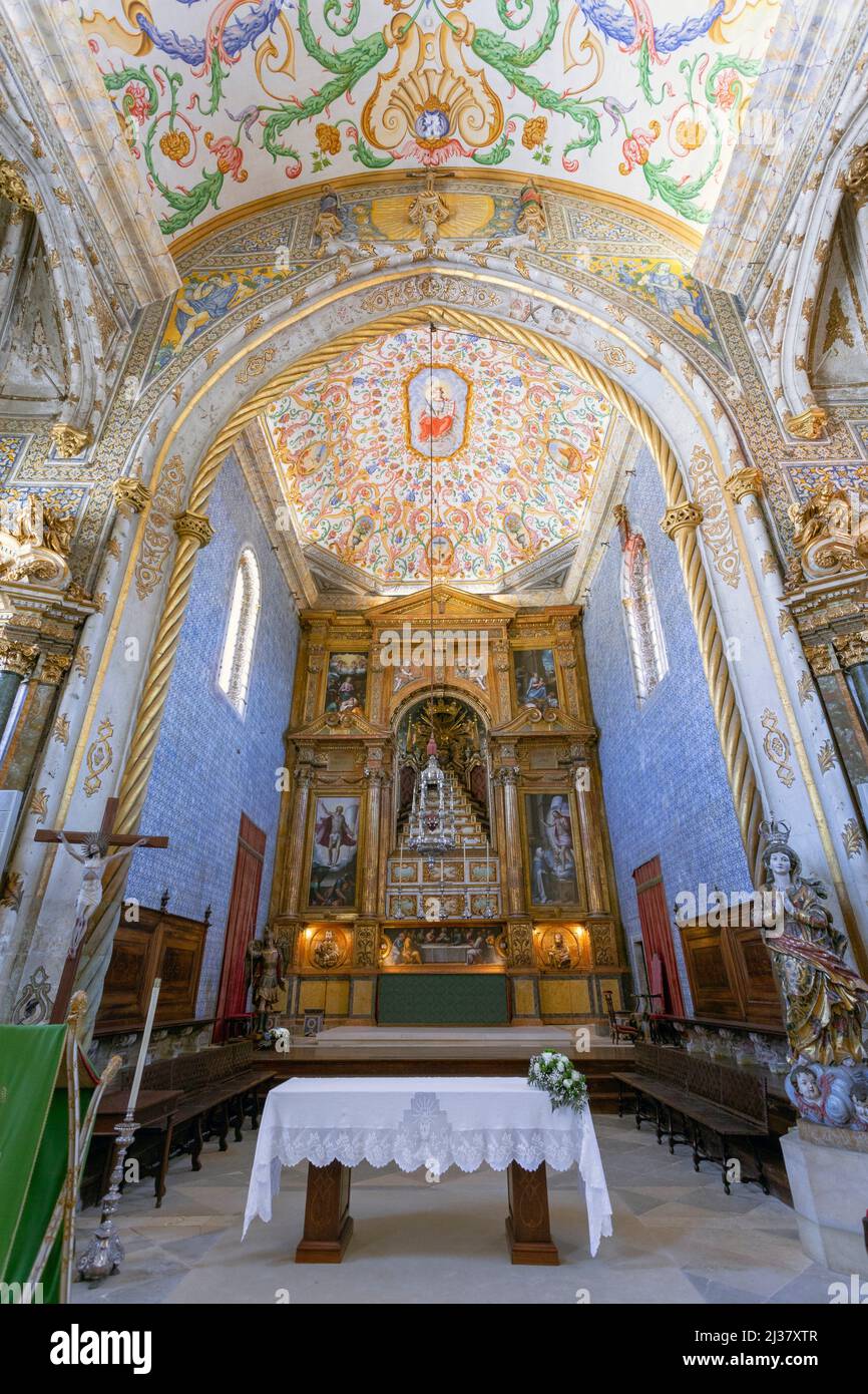 Europe, Portugal, Beira Litoral Province, Coimbra University, Ornate Altar and Decorations inside the Capela de Sao Miguel (Saint Michael's Chapel). Stock Photo