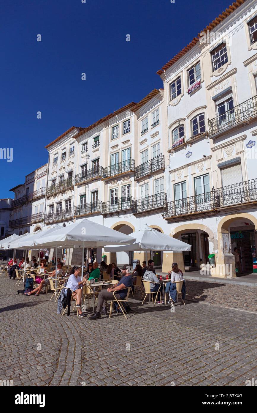 Europe, Portugal, Alentejo Region, Évora, Traditional Architecture and Pavement Cafés on Giraldo Square. Stock Photo