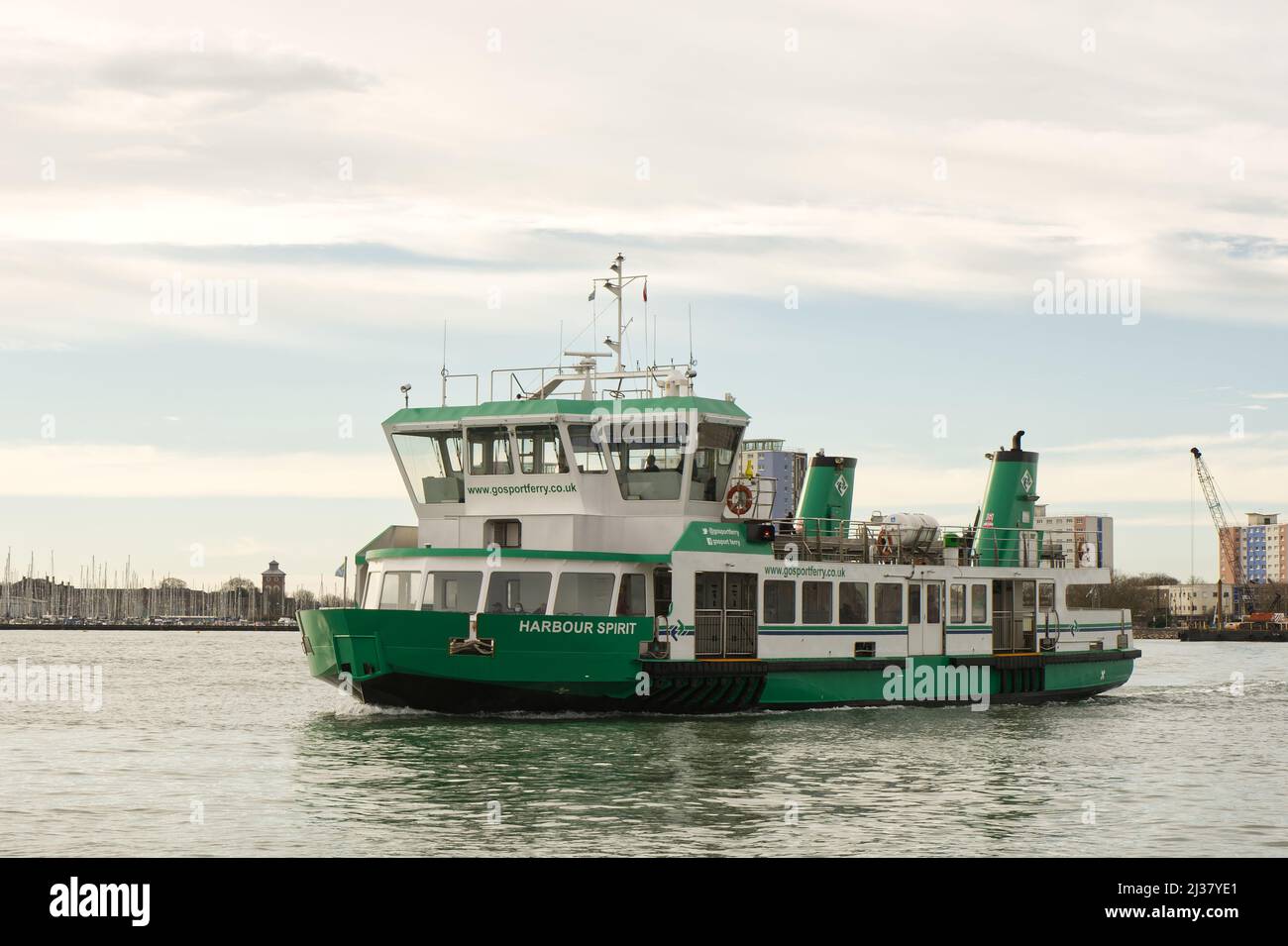 The Gosport passenger ferry crossing Portsmouth Harbour in Hampshire, England Stock Photo