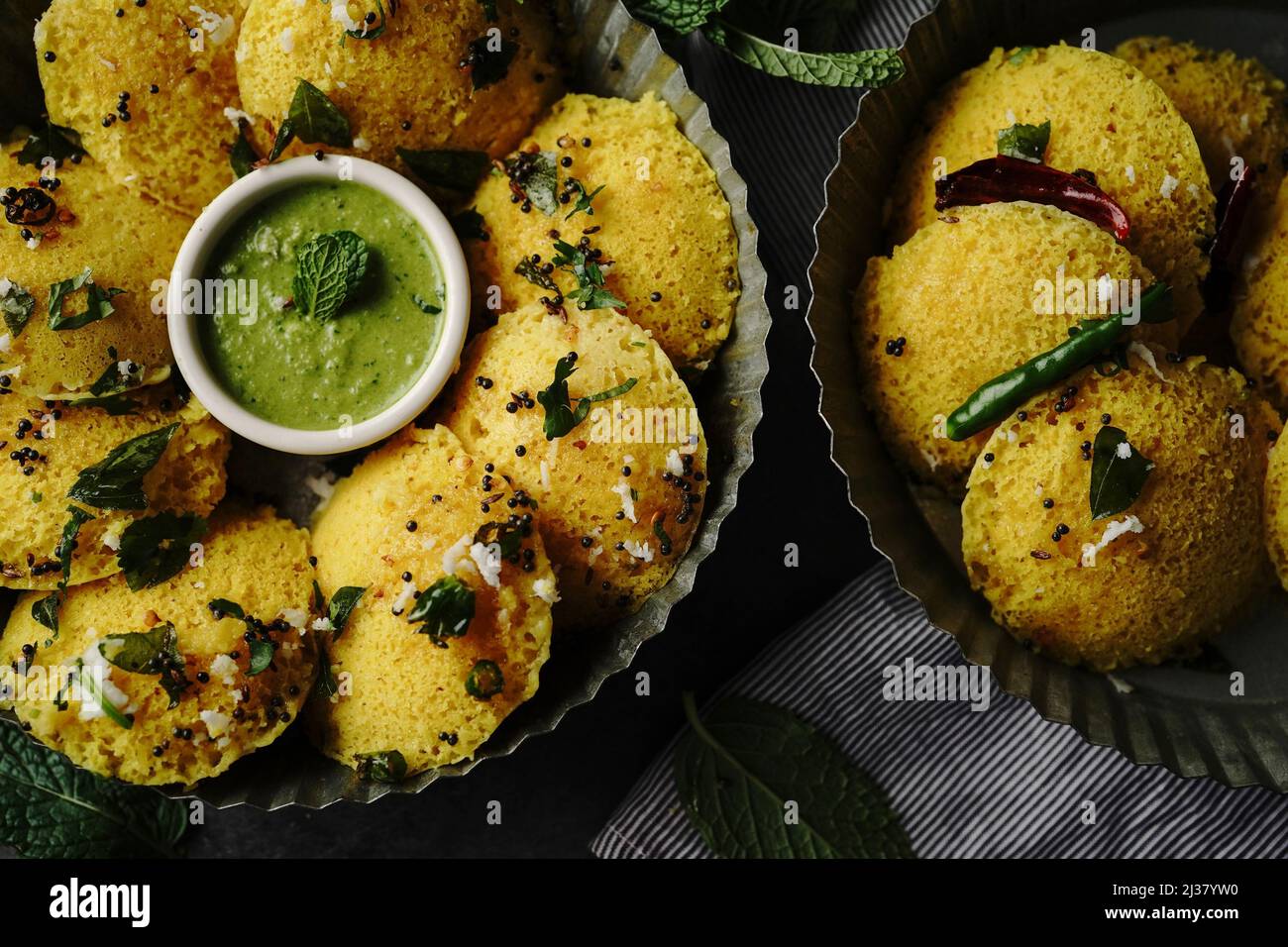 Idli Dhokla - Gluten free gujarati steamed breakfast with chickpea flour Stock Photo
