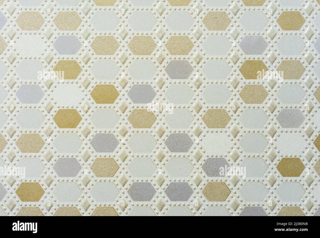 Ceramic tiles with yellow and blue geometric shapes and voluminous white dots. Stock Photo