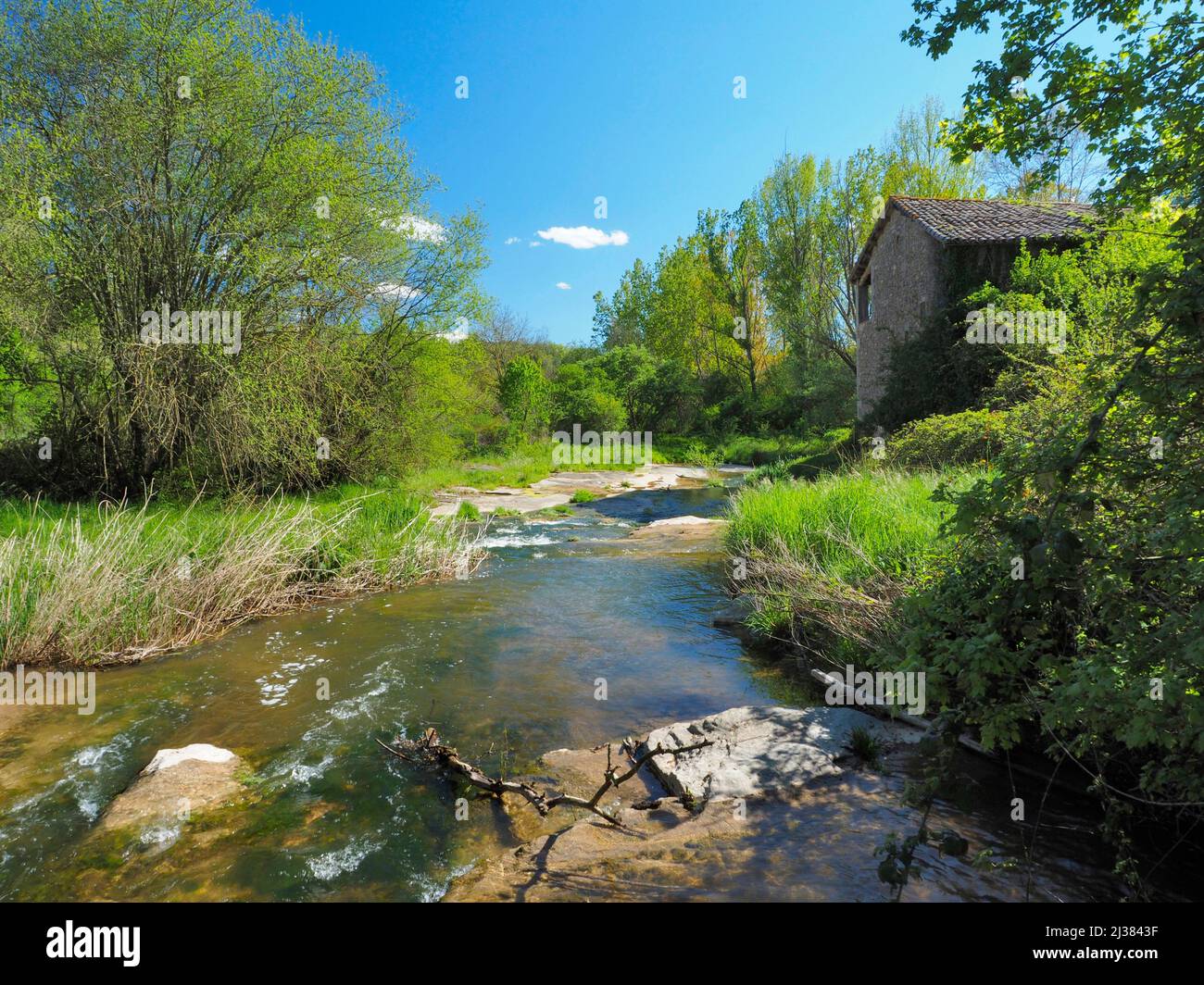 Watermill at Gavarresa stream. Springtime at Perafita village countryside. Lluçanès region, Barcelona province, Catalonia, Spain. Stock Photo