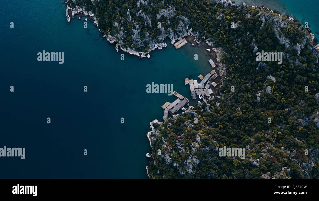 The village of Kalekoy, Kekova view from drone. the Byzantine Simena castle in the centre near Kekova island in the Antalya Province of Turkey. High q Stock Photo