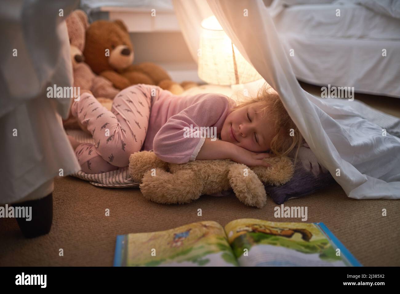 Goodnight, sleep tight. Cropped shot of a little girl sleeping under a