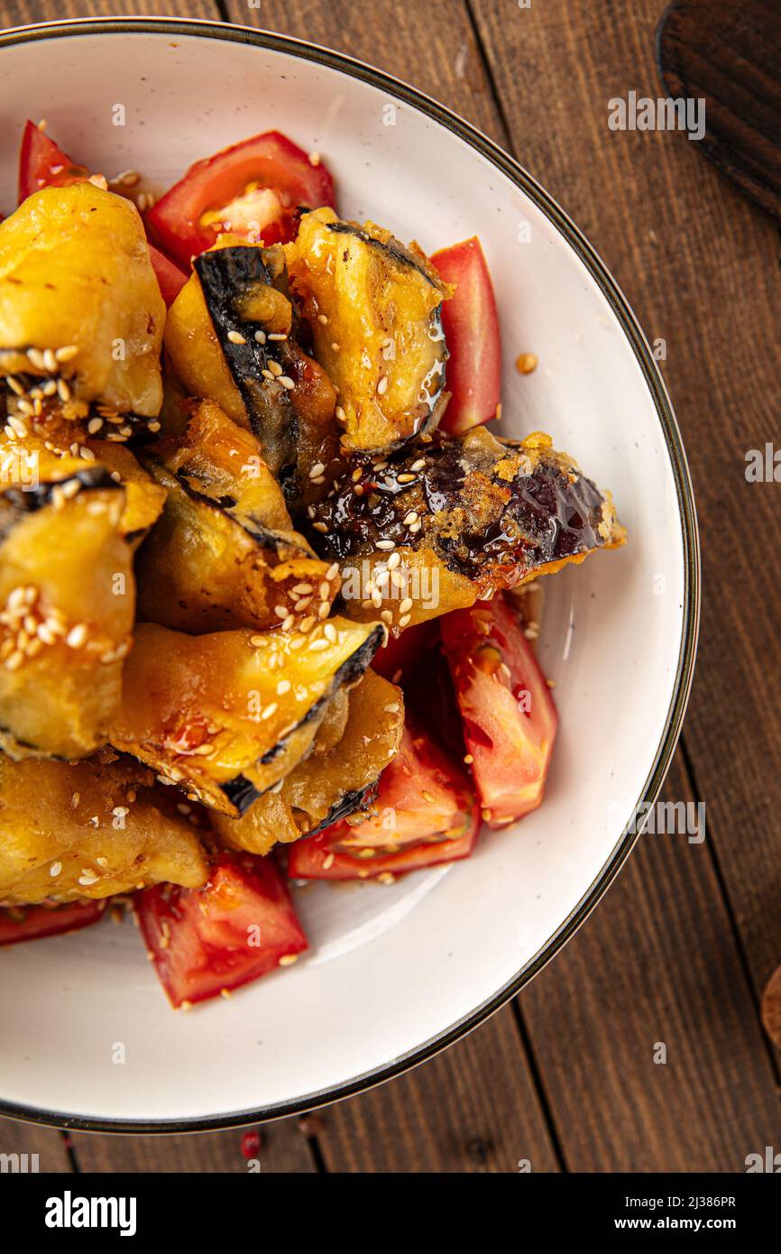 Sweet chili crispy battered eggplants salad Stock Photo Alamy