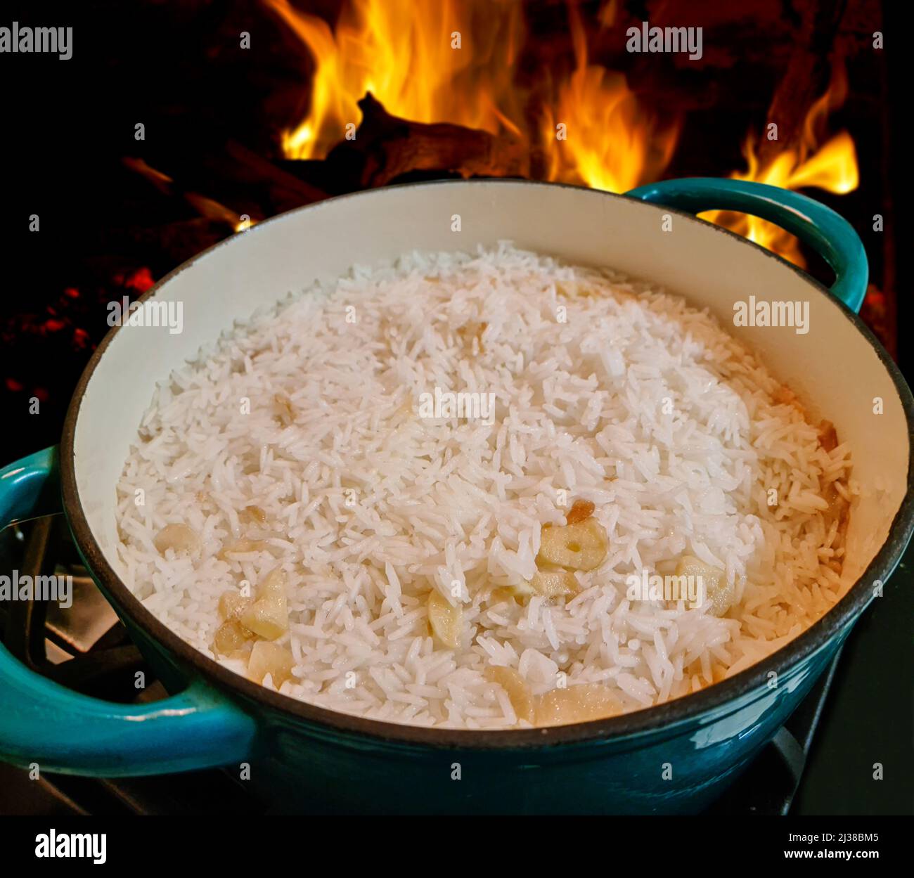 White rice cooked with garlic Stock Photo - Alamy