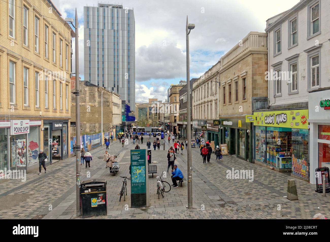 Glasgow, Scotland, UK 6th  April, 2022. UK  Weather: :  Changeable weather saw people take to the streets wary of a change in conditions. Sauchiehall street pedestran precinct.  Credit Gerard Ferry/Alamy Live News Stock Photo