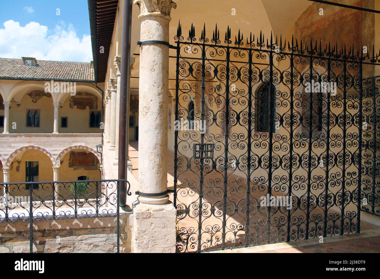 Cloisters of the Basilica of San Francesco in Asissi in Umbria in Italy Stock Photo