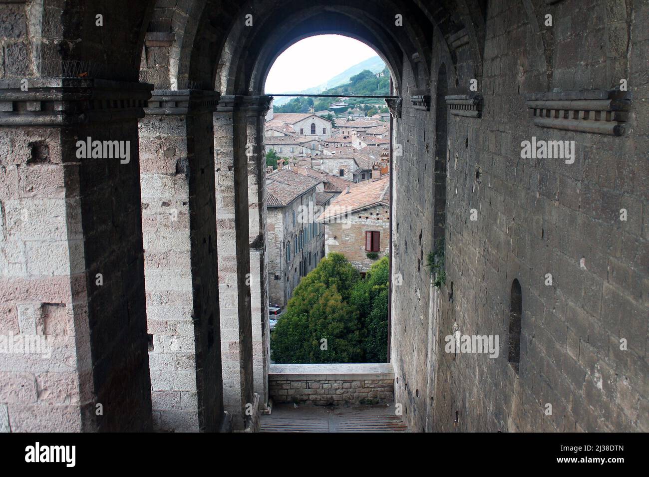 The arches of the medieval buildings in the center of Gubbio in Umbria in Italy Stock Photo