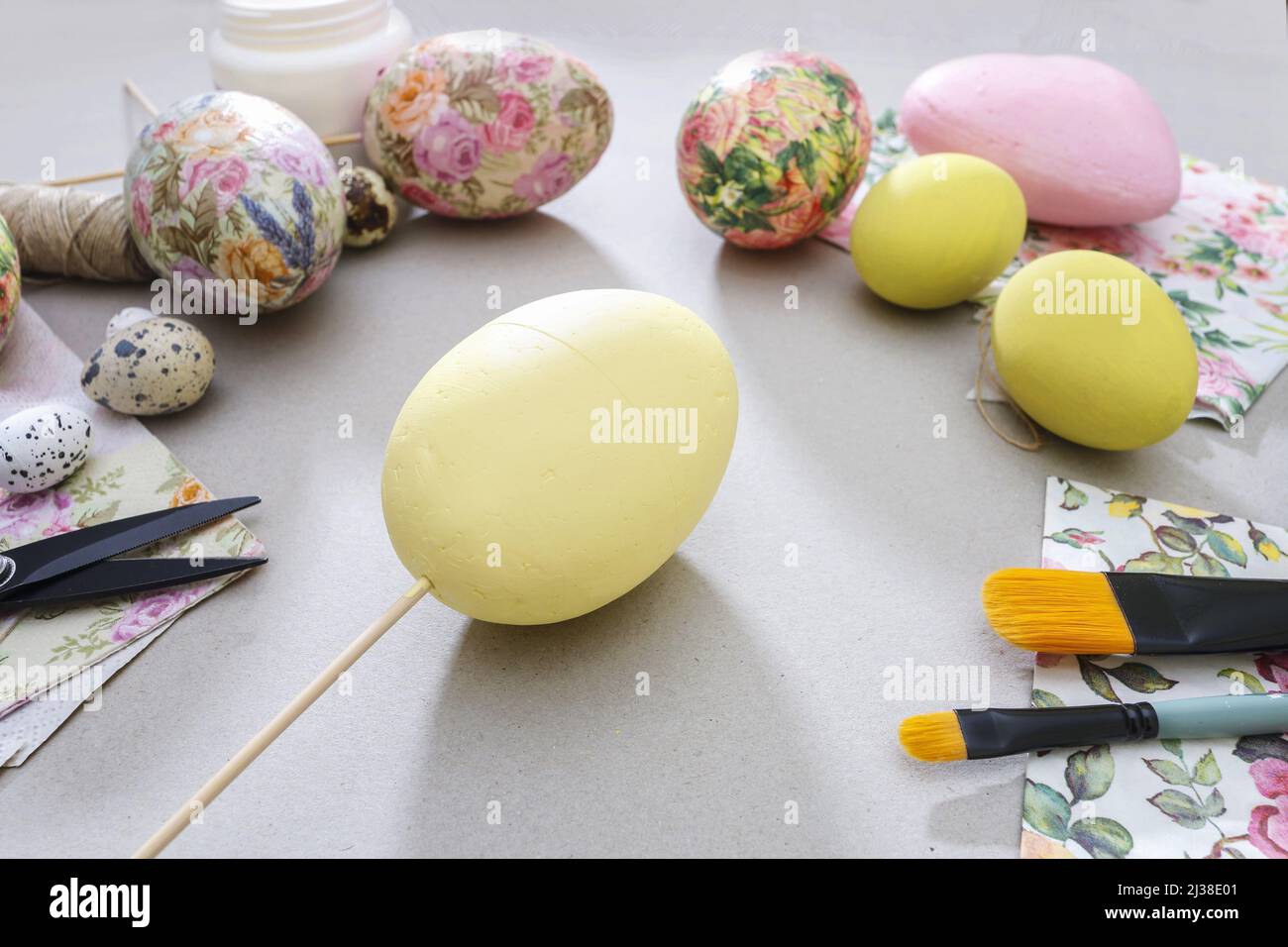 Decorating Easter eggs with decoupage technique. Hobby time Stock Photo