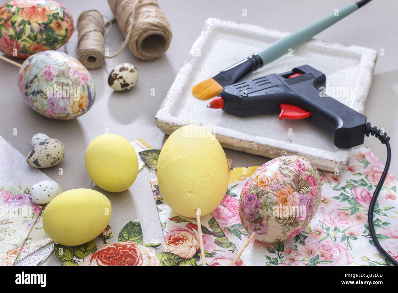 Decorating Easter eggs with decoupage technique. Hobby time Stock Photo
