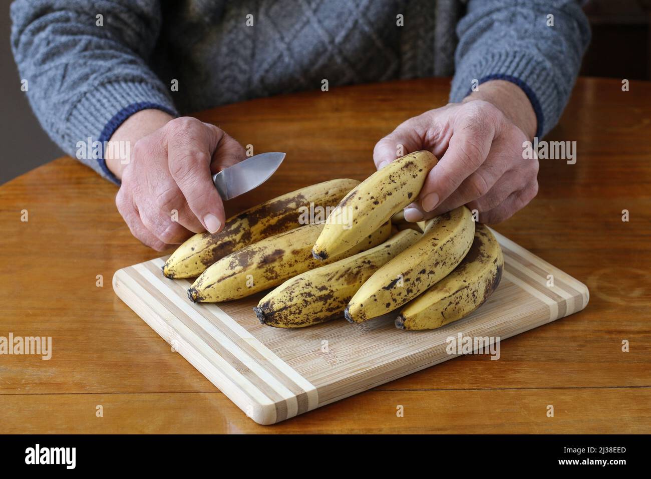 Peeling banana hi-res stock photography and images - Alamy