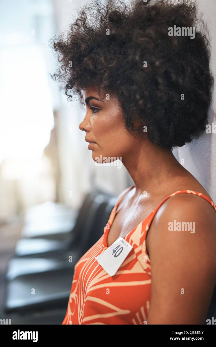 African woman sitting alone side view hi-res stock photography and ...