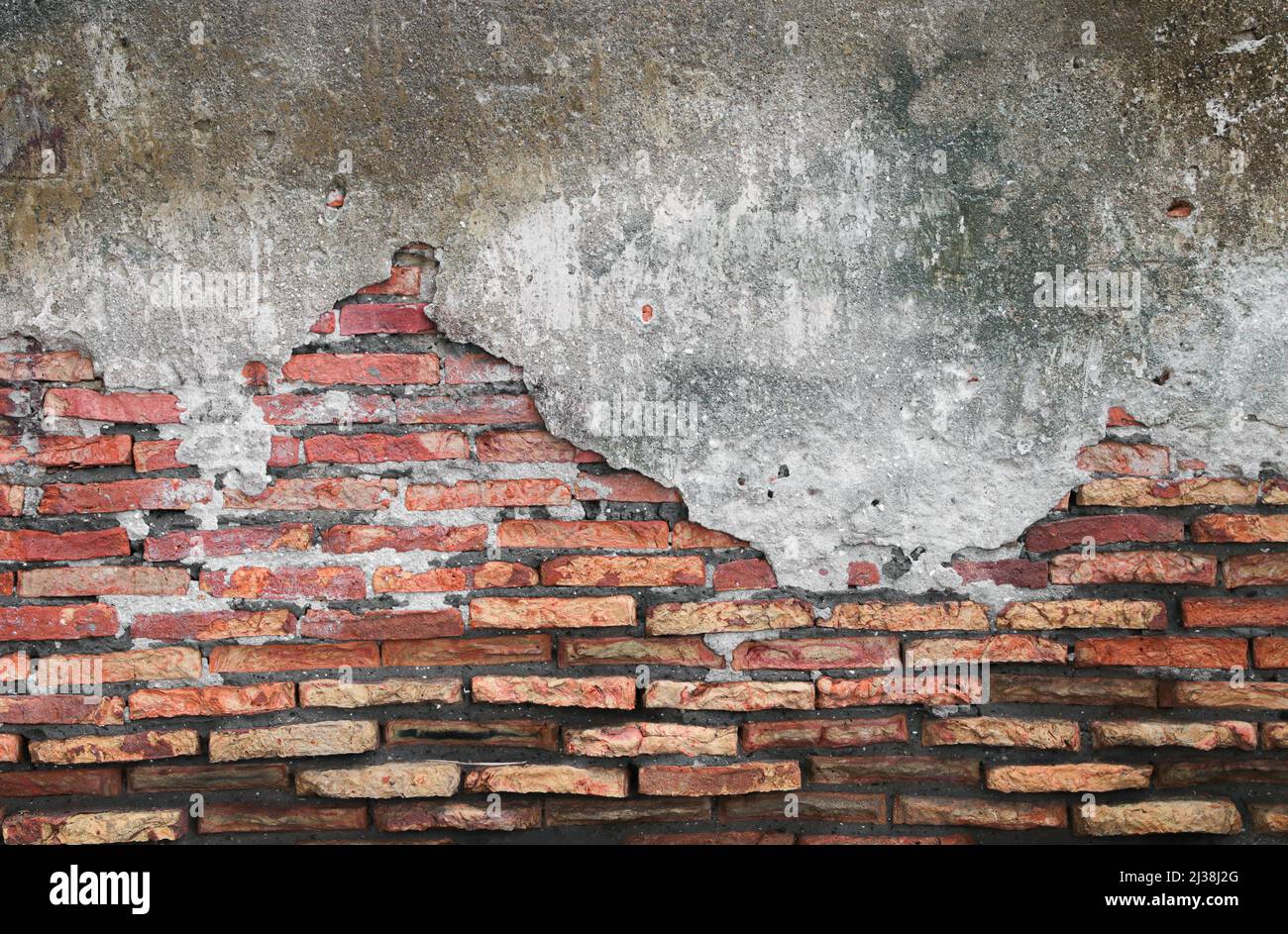 red brick block wall texture old background. ancient weathered wall with crack Stock Photo
