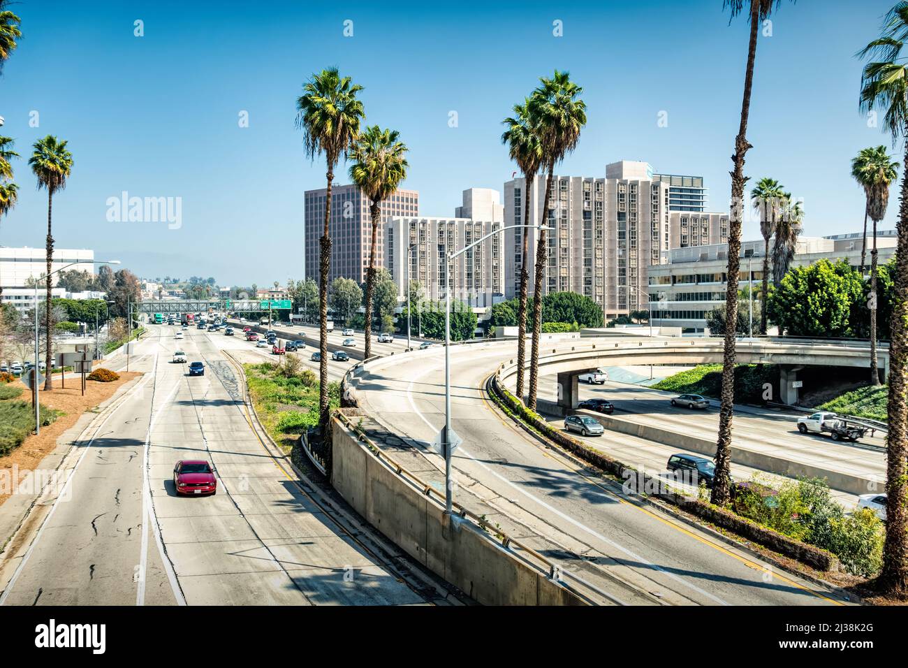 Cars drive on Freeway 110 in downtown in Los Angeles California USA on