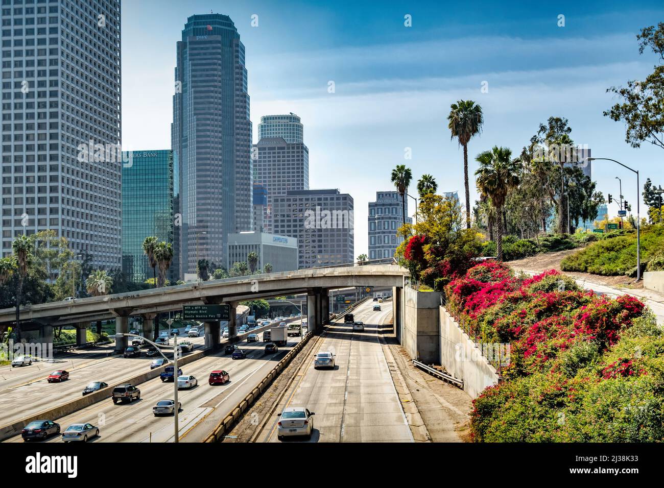 Cars drive on Freeway 110 in downtown in Los Angeles California USA on