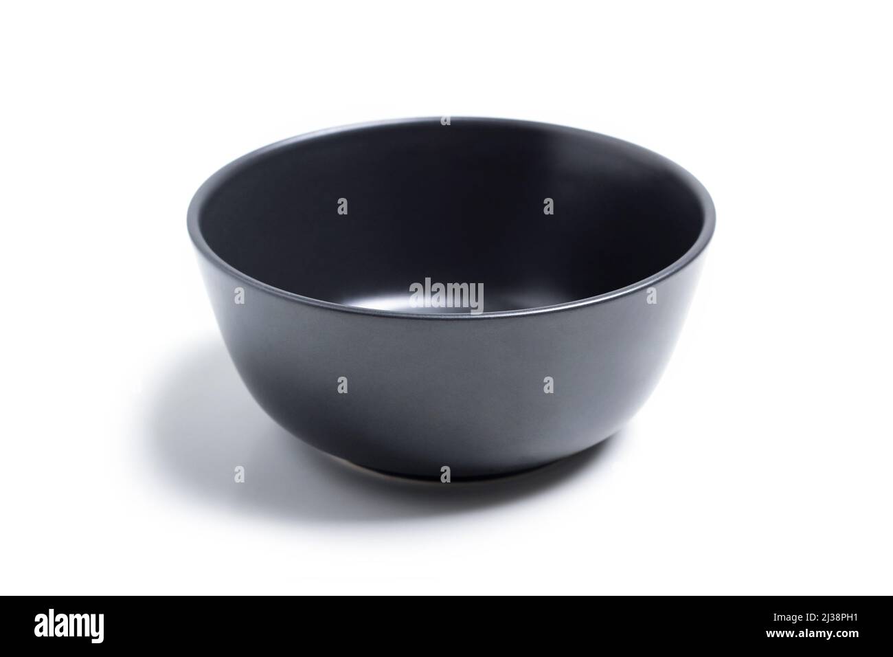 Black clay bowl isolated on white background Stock Photo