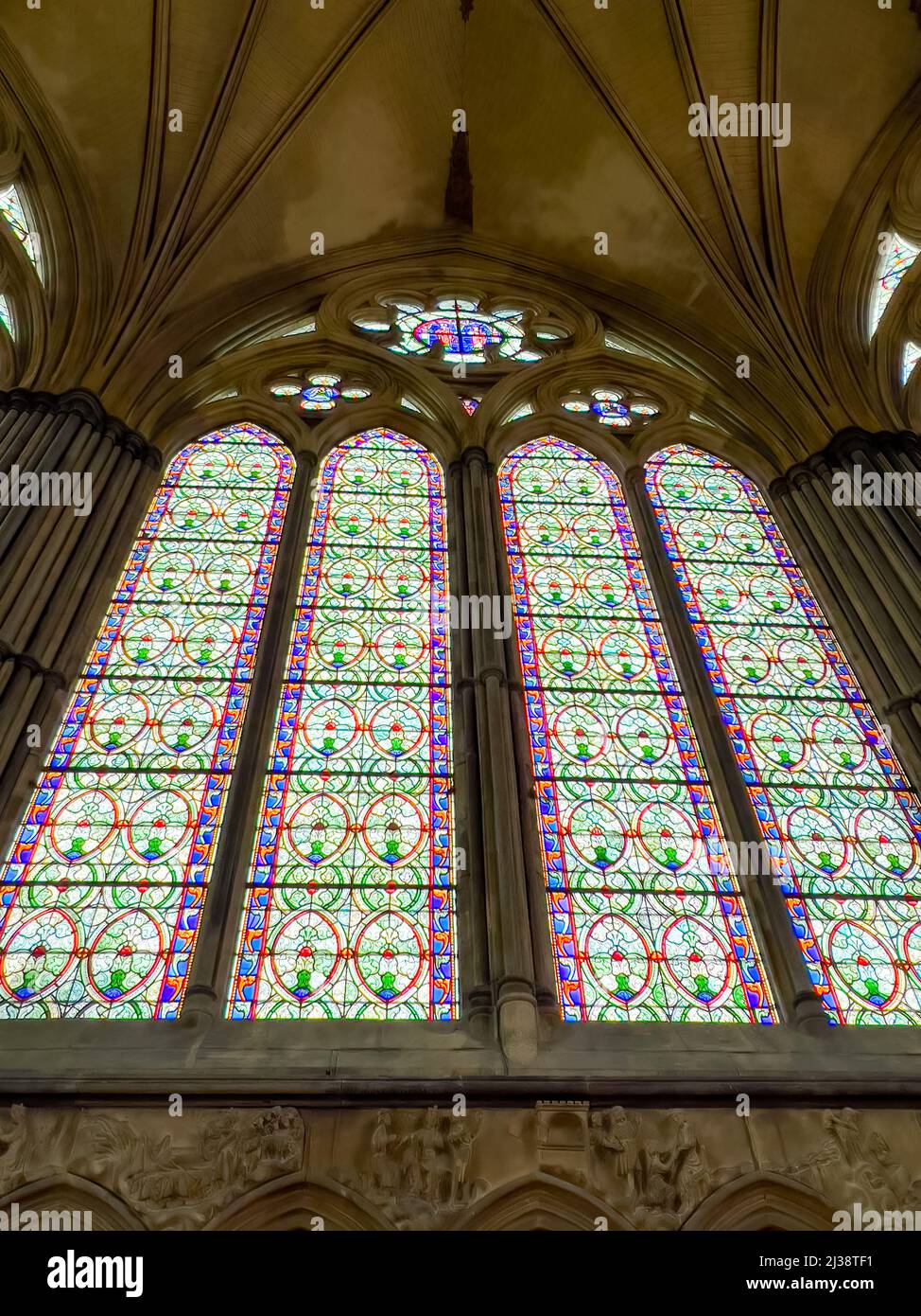stain glass windows adorning the Western facade of Salisbury Cathedral