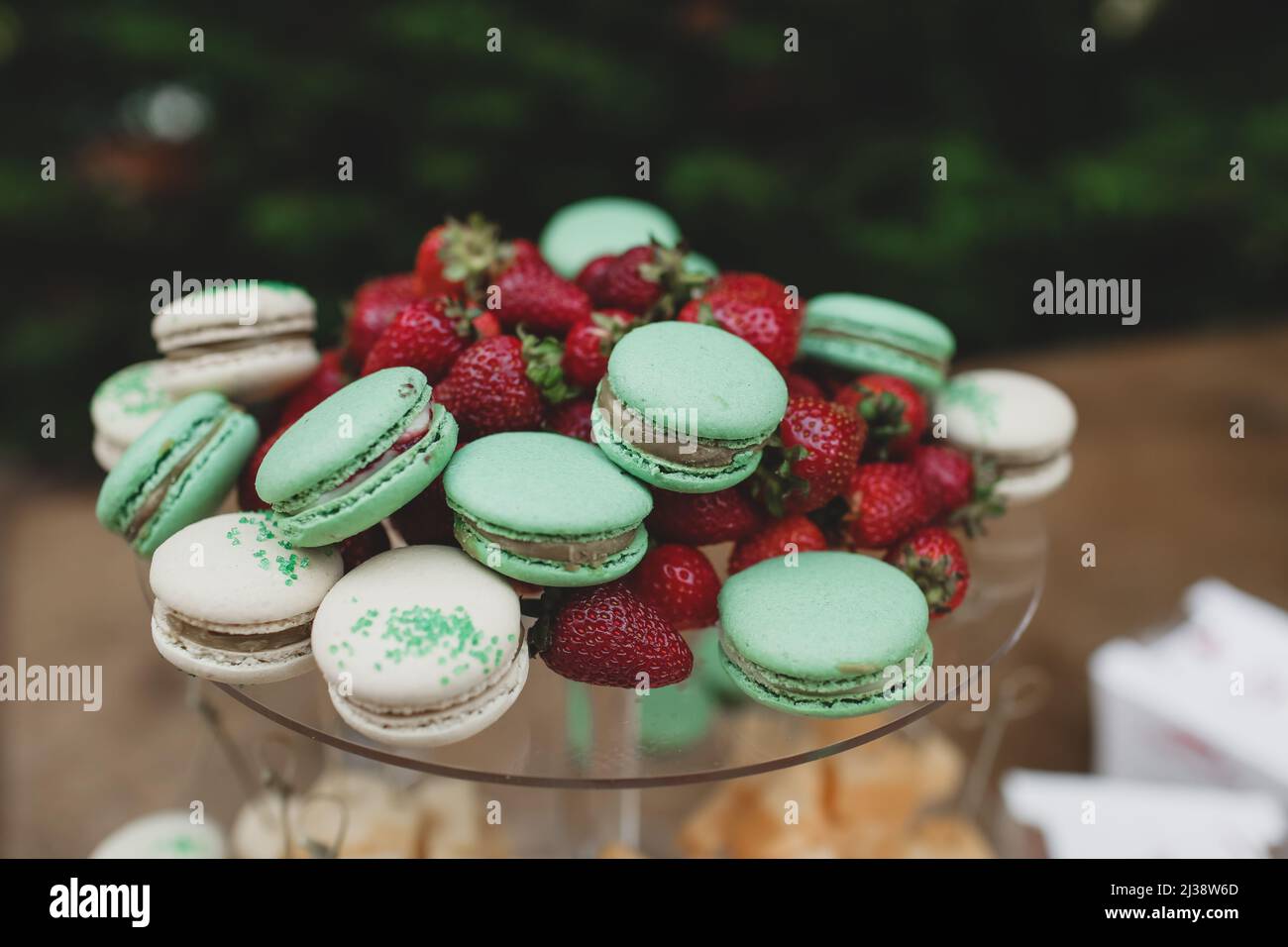 Colored sweet macarons cakes at an event. Stock Photo
