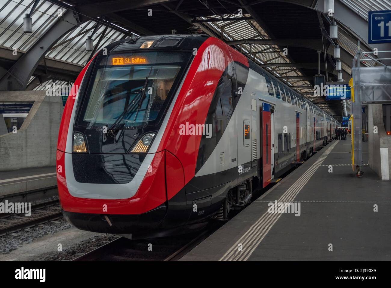 Red Train Fast Red fast high speed train in Zurich station in south of Switzerland ...