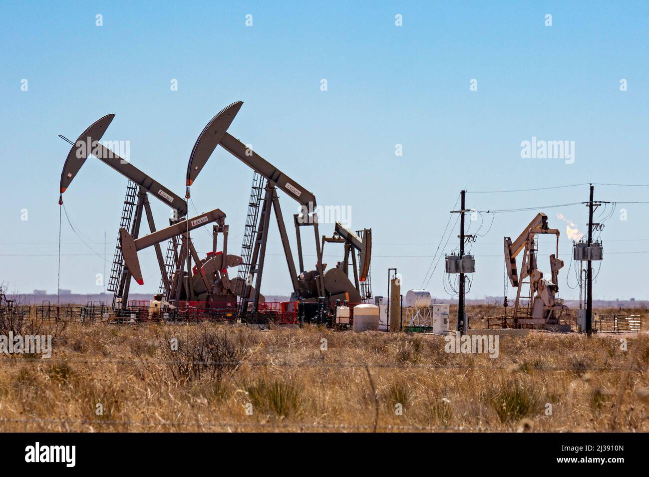 Hobbs, New Mexico Oil wells pumping in the Permian Basin. The Permian