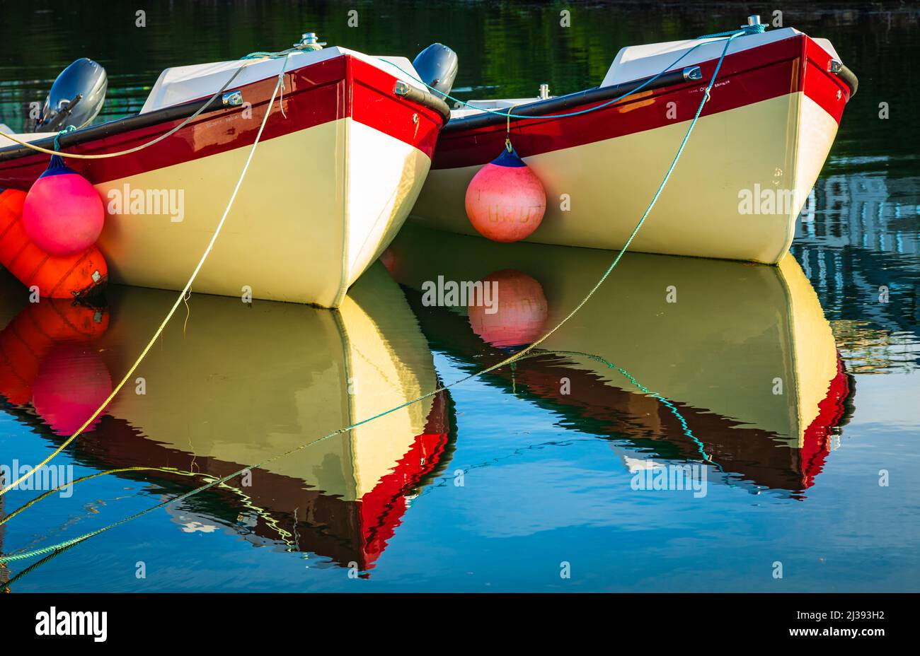 A pair of dinghies in Roundstone harbour, Connemara, County Galway Ireland. Stock Photo