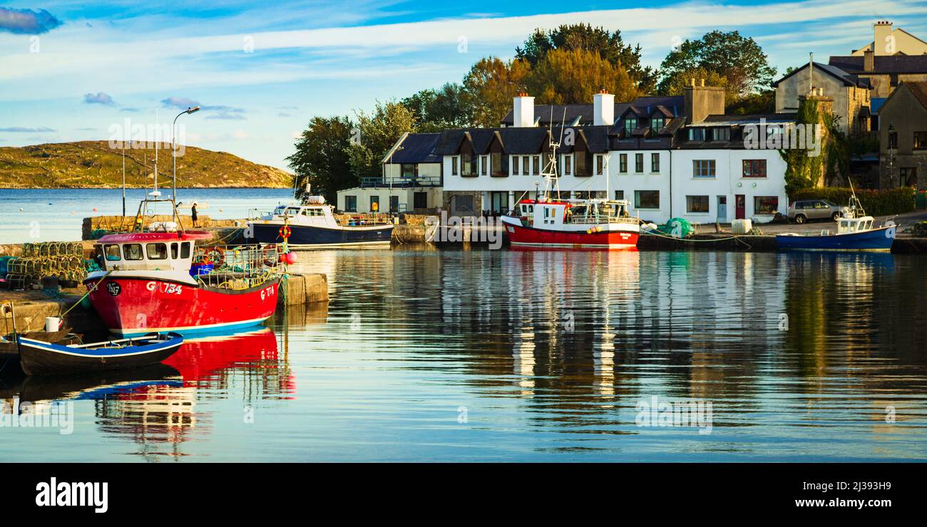 Water reflection roundstone village county galway ireland hires stock
