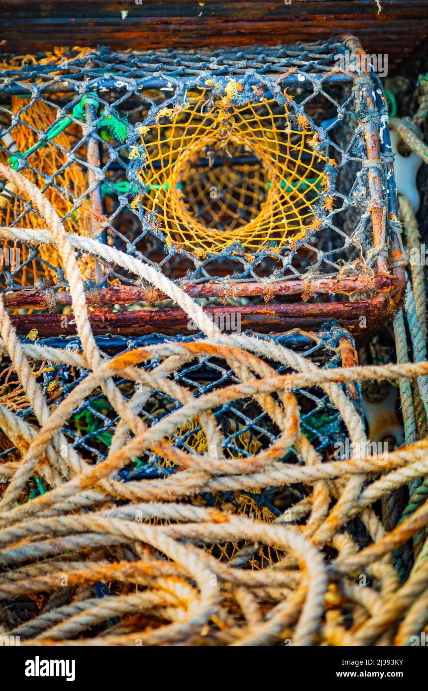 Rope and lobster creels at Roundstone harbour, Connemara, County Galway, Ireland. Stock Photo