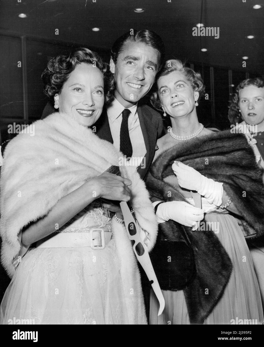Peter Lawford, star of Exodus, (Part I on Ten at 9 pm) never went to school. Merle Oberon, Peter Lawford, Rocky Cooper. June 10, 1955. Stock Photo