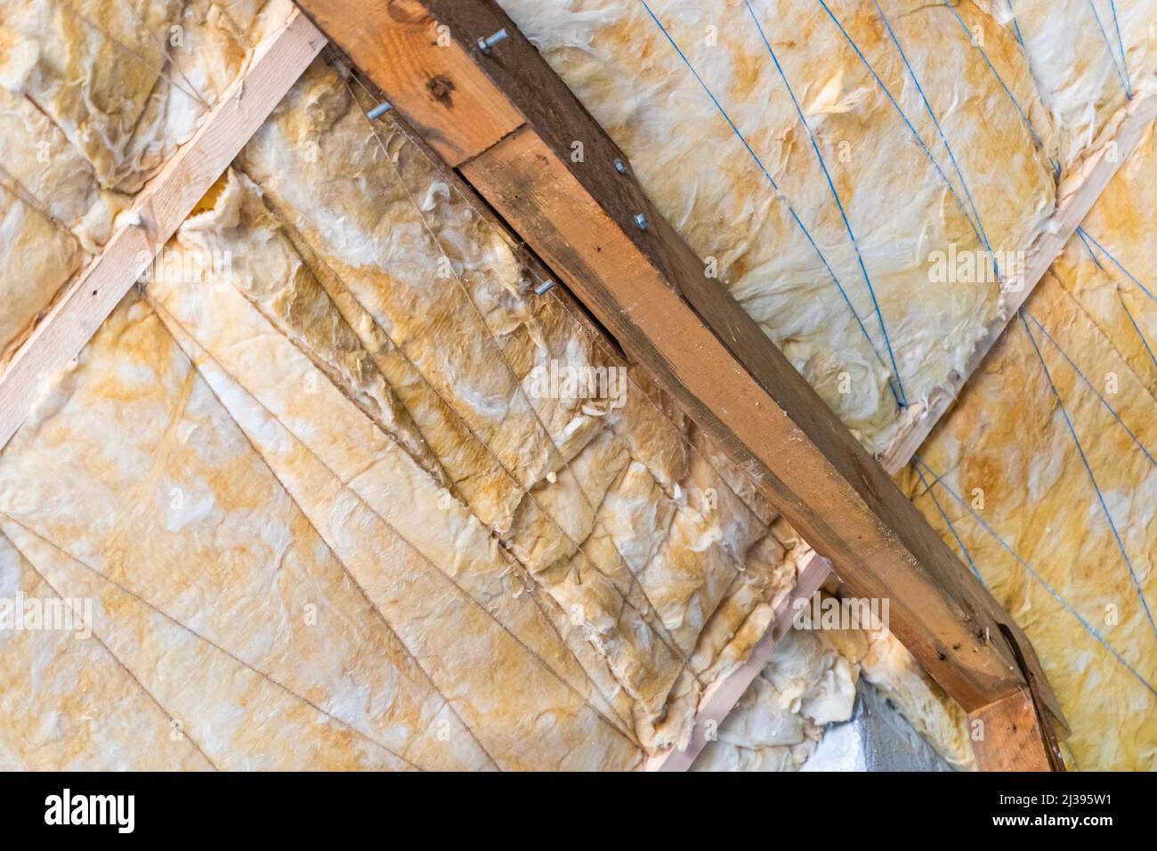 Insulation of the ceiling of a private house with cotton sheet