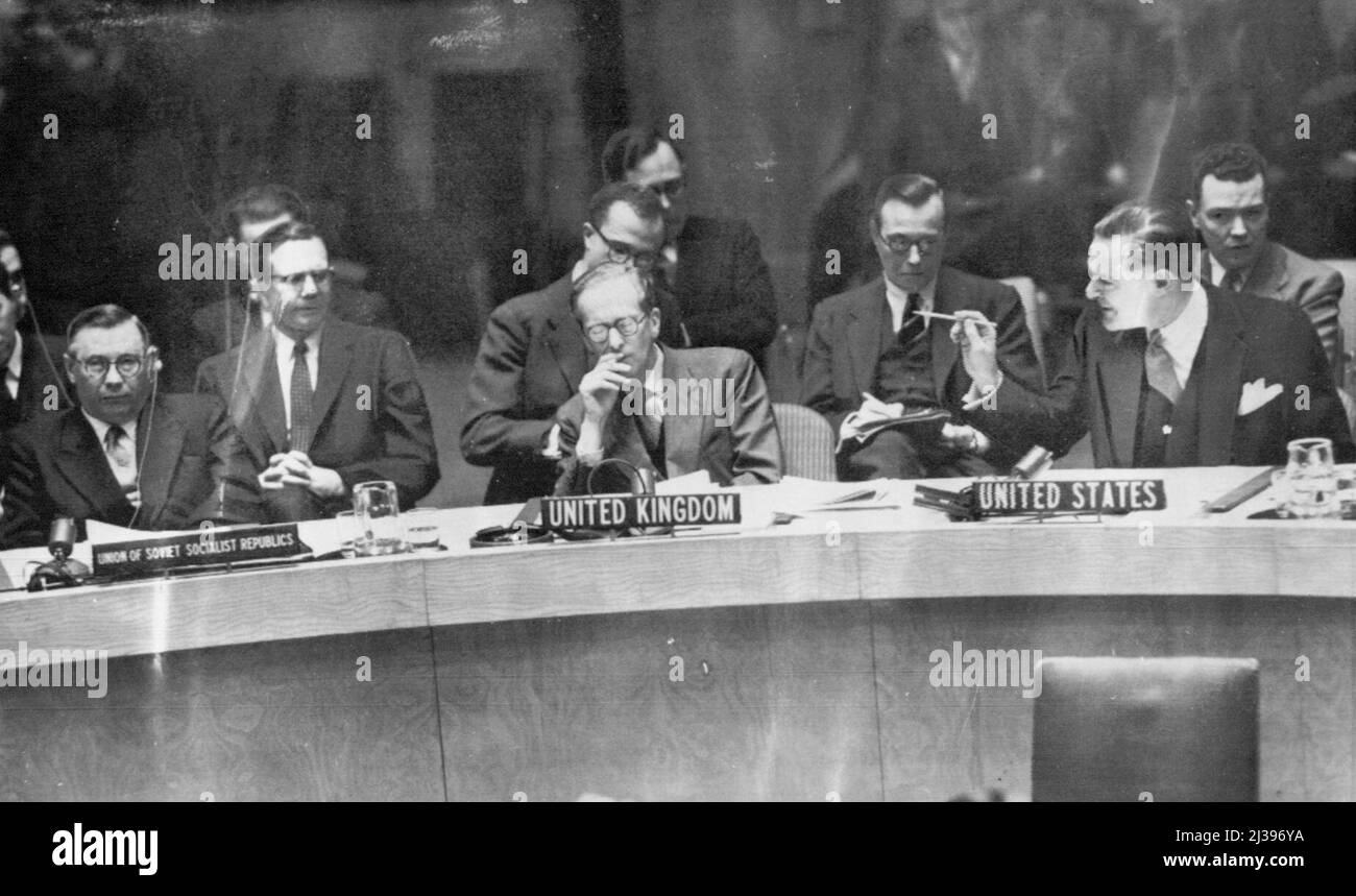 Pointed Remark -- Henry Cabot Lodge Jr. of the United States points a pencil at Russia's A.A. Sobolev, left, yesterday as he tells the Security Council that the Soviet representative is the man responsible for vetoes which barred Japan from admission to the United Nations. Between them is Britain's Sir Pierson Dixon. Faced with a certain Russian veto, the Council postponed indefinitely a vote on a British resolution favoring Japan's admission, apparently ending all attempts to give Japan membership at this year's session. December 22, 1955. (Photo by AP Wirephoto). Stock Photo