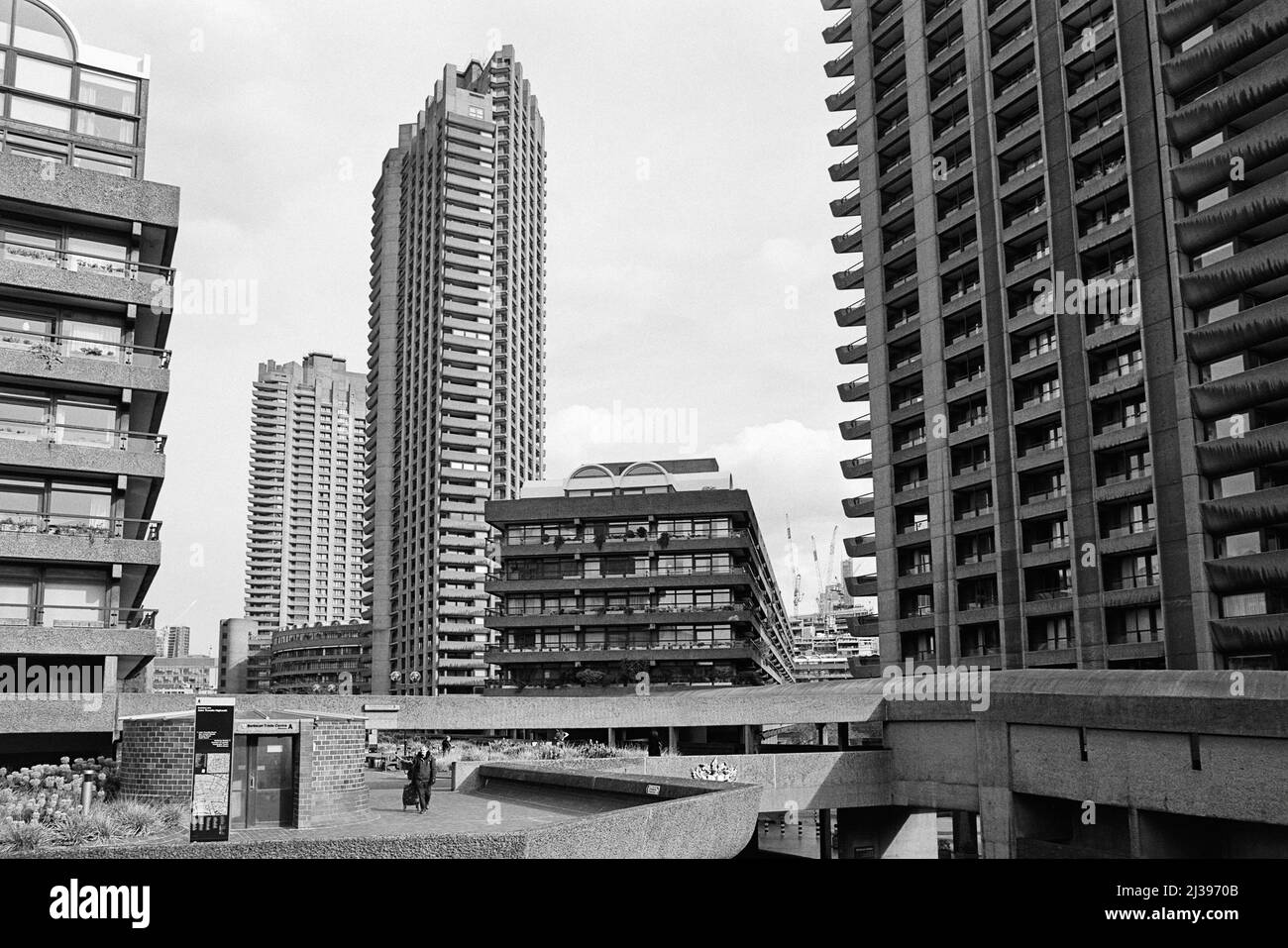 Apartments and tower blocks on the Barbican Estate, viewed from John Trundle Highwalk, in the City of London, South East England Stock Photo