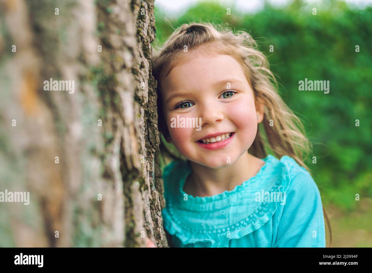 little girl in the summer on nature little girl Stock Photo Alamy