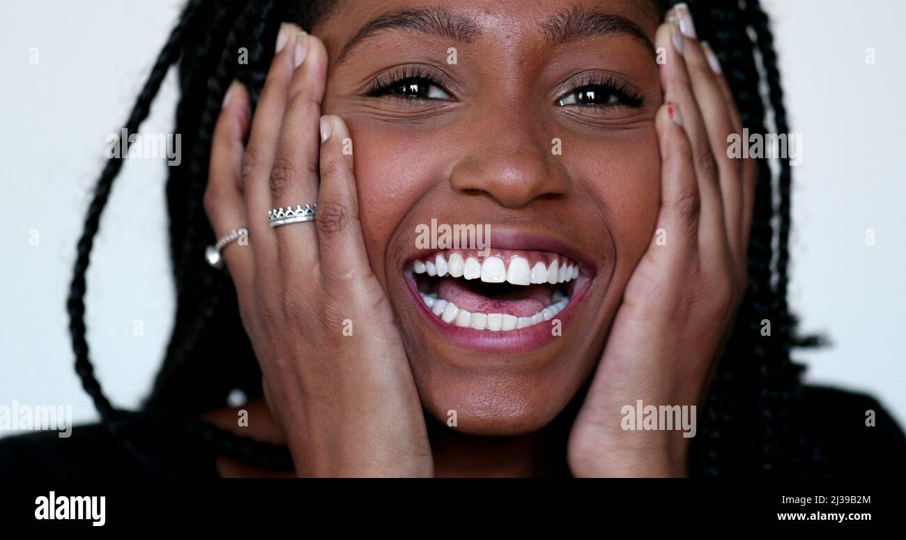 Pretty black teen girl laughing and smiling portrait face Stock Photo ...