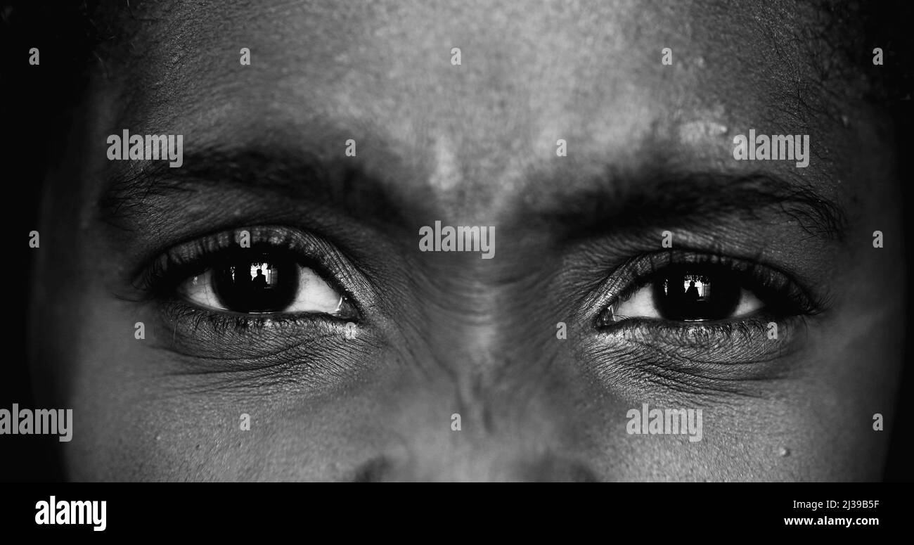 Upset black girl macro close-up. Monochrome African ethnicity feel anger Stock Photo