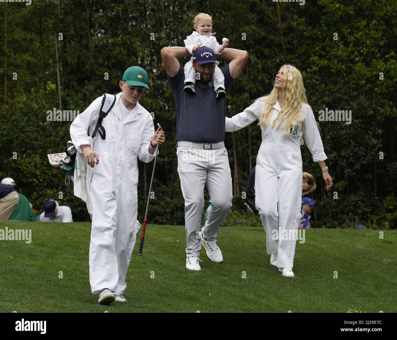 Augusta, United States. 06th Apr, 2022. Jon Rahm of Spain holds his son Kepa as he and his wife Kelley compete in the Par 3 Contest at the Masters golf tournament at Augusta National Golf Club in Augusta, Georgia on Wednesday, April 6, 2022. Photo by Bob Strong/UPI Credit: UPI/Alamy Live News Stock Photo