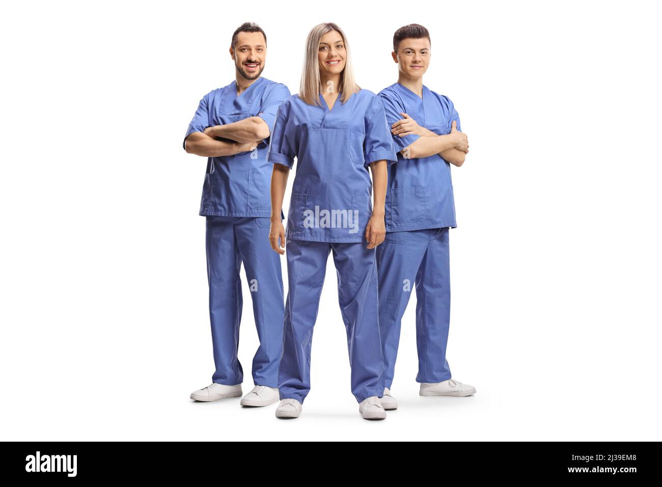 Team of health care workers in blue uniforms isolated on white