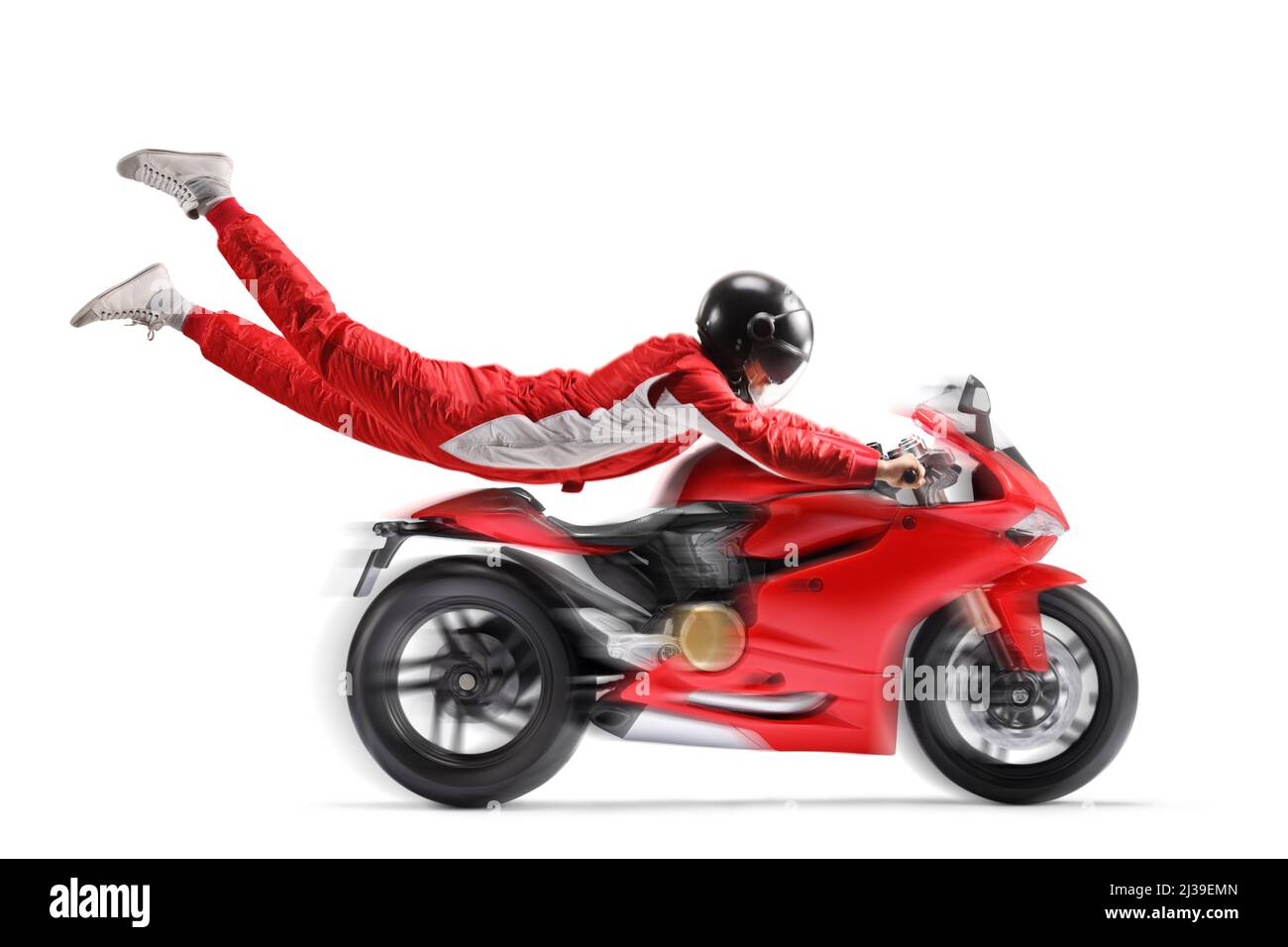 Racer flying and holding onto a red motorbike isolated on white background Stock Photo