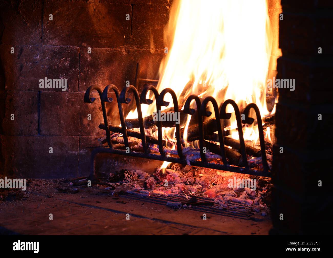 fireplace at home with hot flames in the fire Stock Photo - Alamy