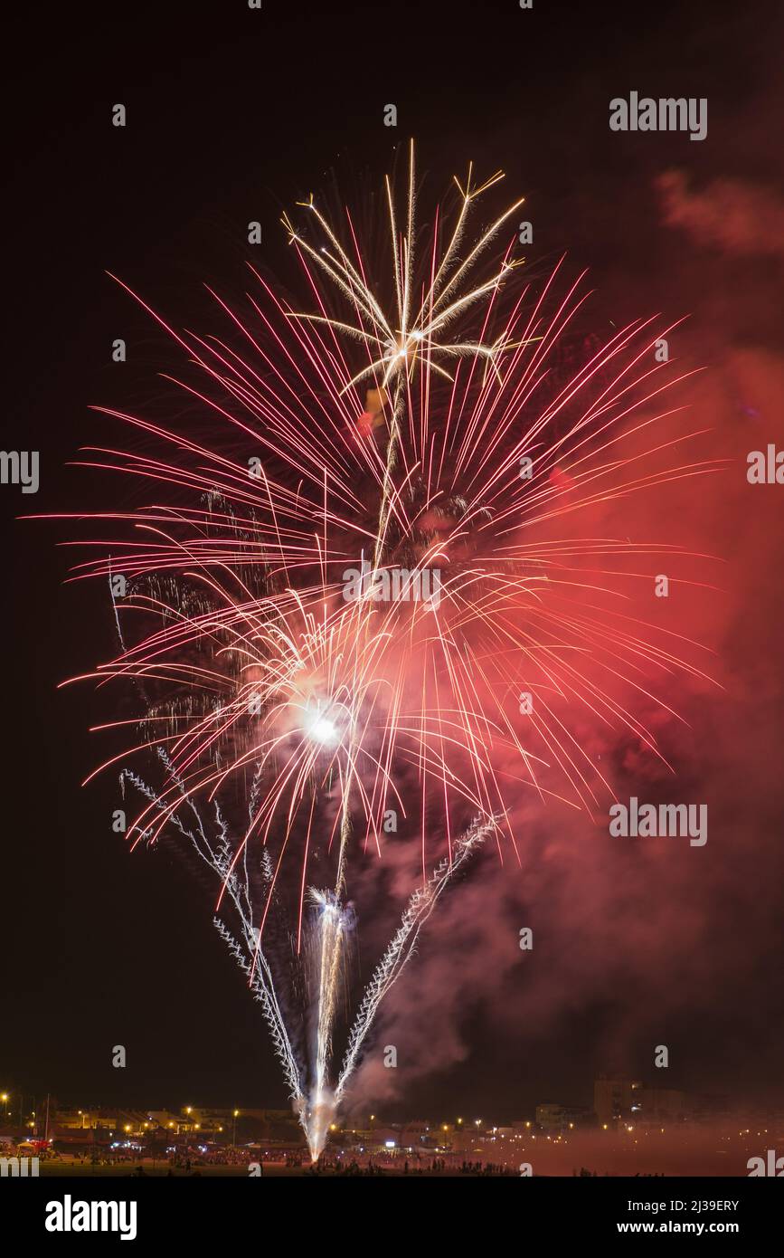 The fireworks on a beach during a night party in San Juan, Puerto Rico
