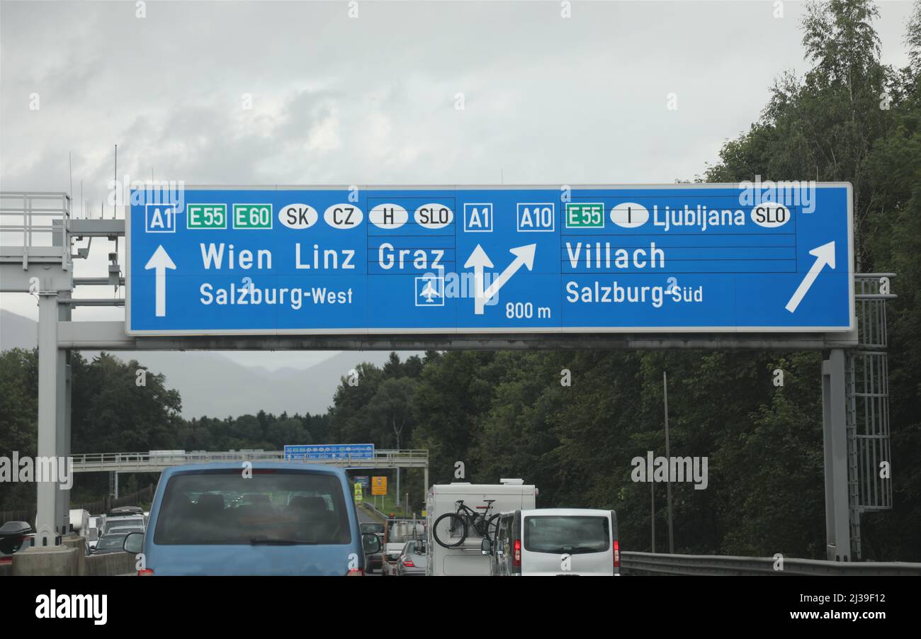 road sign in the highway with cars with directions to the city of Wien Linz  or Graz that towards the Austrian borders with other European nations Stock  Photo - Alamy